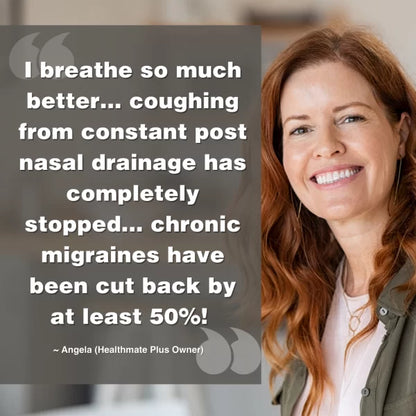 A smiling woman with long red hair stands beside a testimonial that says: Since using the Austin Air Healthmate Plus Air Purifier, I breathe much better—my coughing from post nasal drainage is gone and my chronic migraines have been cut by at least 50%!.