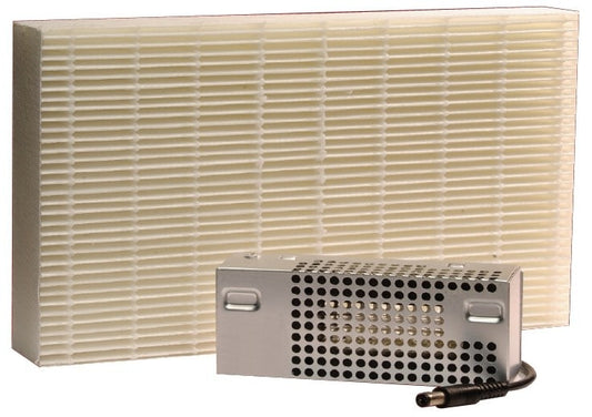 A rectangular air filter with a white grid pattern stands behind a small, silver EdenPURE Air Purification Kit featuring ventilation holes and a black power cord.