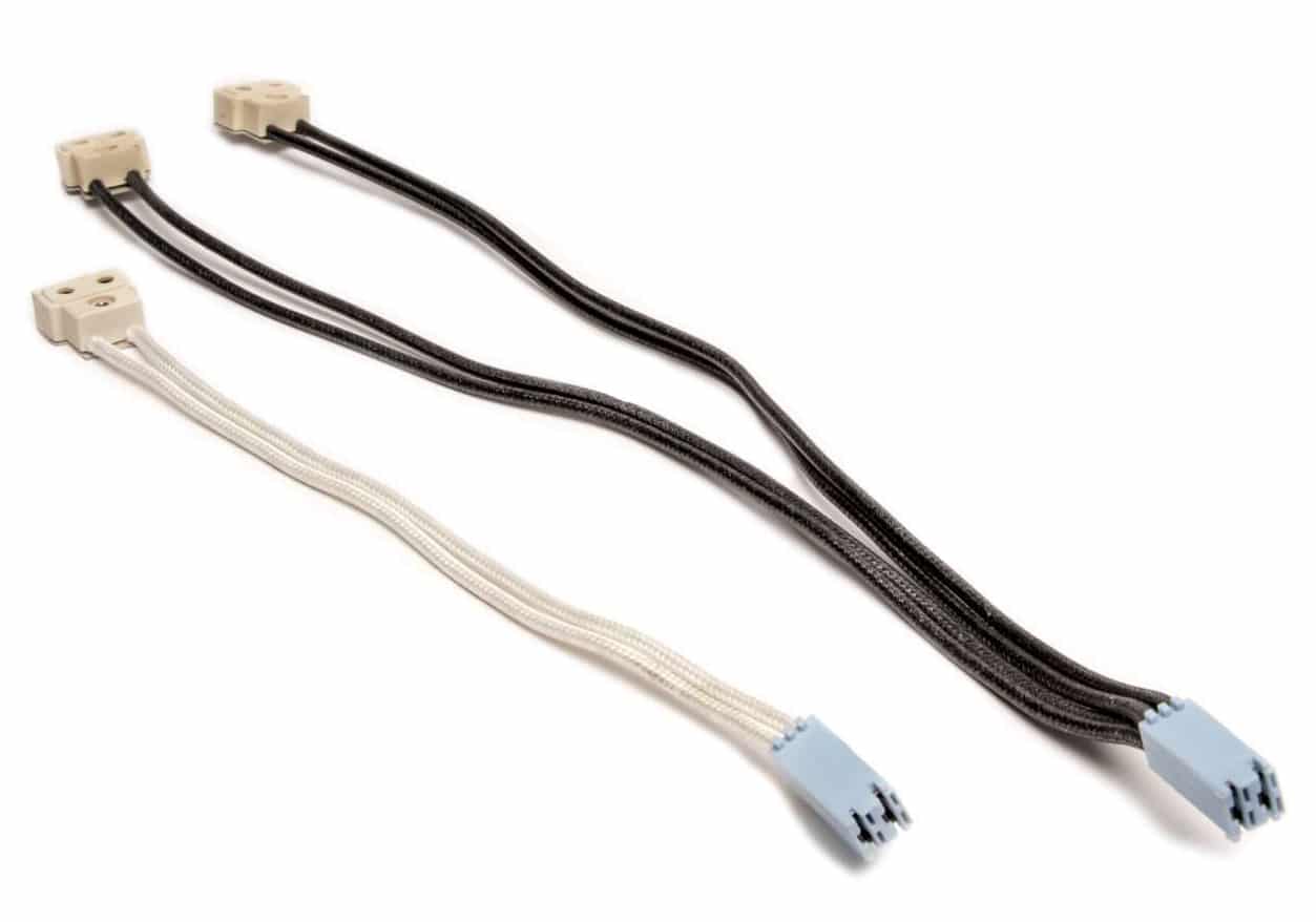 The GEN 4 1000 Bulb Connector Set includes two wiring harnesses with connectors—one with black wires, the other with white—shown on a white background and compatible with EdenPure devices.